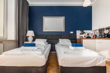 Фото номера Стандартный трехместный номер-студио Апартаменты Smolna Apartments by Your Freedom г. Варшава 38