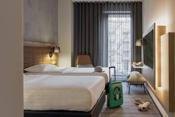 Фото номера Двухместный номер с 2 отдельными кроватями Отель Moxy Warsaw Praga г. Варшава 4