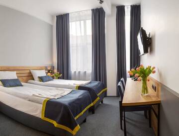Фото номера Просторный двухместный номер с 2 отдельными кроватями Отель Hotel Mokotów г. Варшава 6