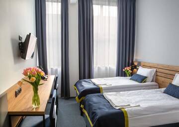 Фото номера Просторный двухместный номер с 2 отдельными кроватями Отель Hotel Mokotów г. Варшава 7