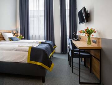 Фото номера Просторный двухместный номер с 2 отдельными кроватями Отель Hotel Mokotów г. Варшава 12