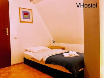 Фото номера Одноместный номер с общей ванной комнатой Мини-отель V Hostel г. Варшава 2