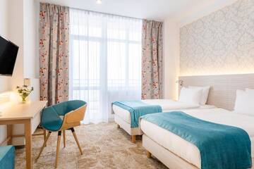 Фото номера Стандартный двухместный номер с 2 отдельными кроватями Отель Hotel Metropol г. Варшава 3
