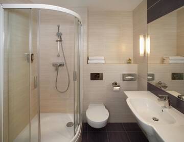 Фото номера Стандартный двухместный номер с 2 отдельными кроватями Отель Hotel Metropol г. Варшава 5