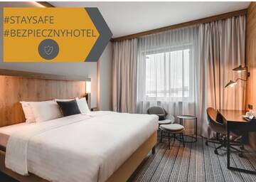 Фото номера Номер Делюкс с 1 кроватью размера «king-size» Отель Courtyard by Marriott Warsaw Airport г. Варшава 11